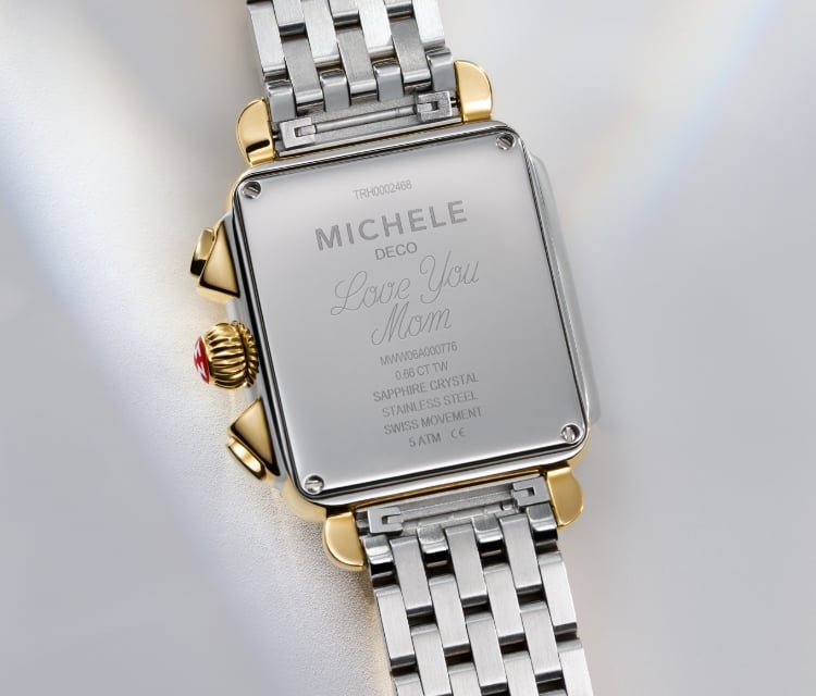 The phrase Love You Mom engraved on the caseback of a MICHELE watch