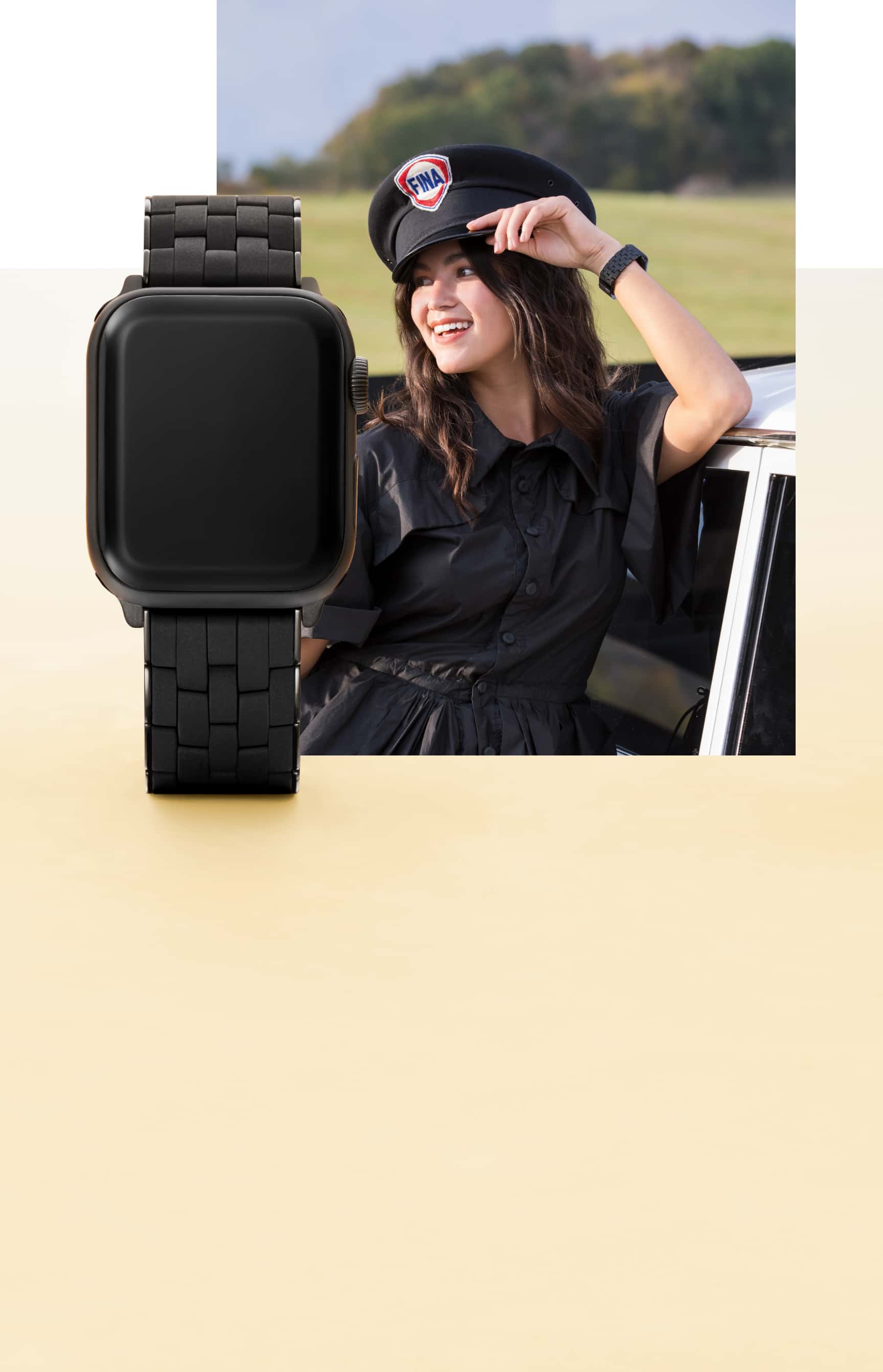 Stylish young woman wearing black silicone band for Apple Watch®