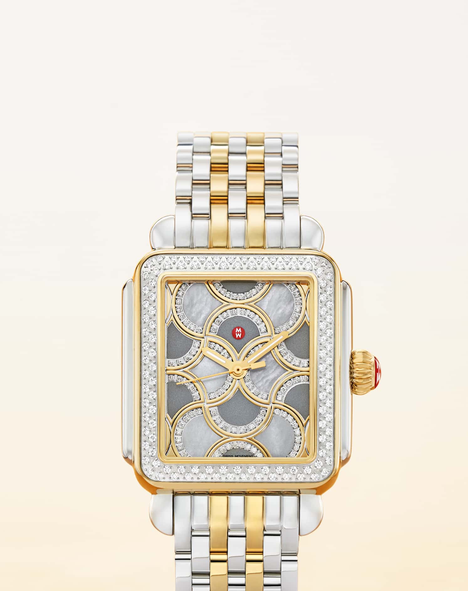 Iconic Deco watch in stainless featuring mother-of-pearl dial, diamond-covered bezel and signature seven-link bracelet.