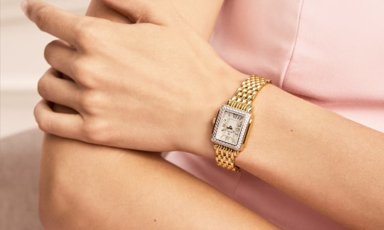 The Deco Madison Mini Diamond 18K Gold-plated watch shown on a wrist