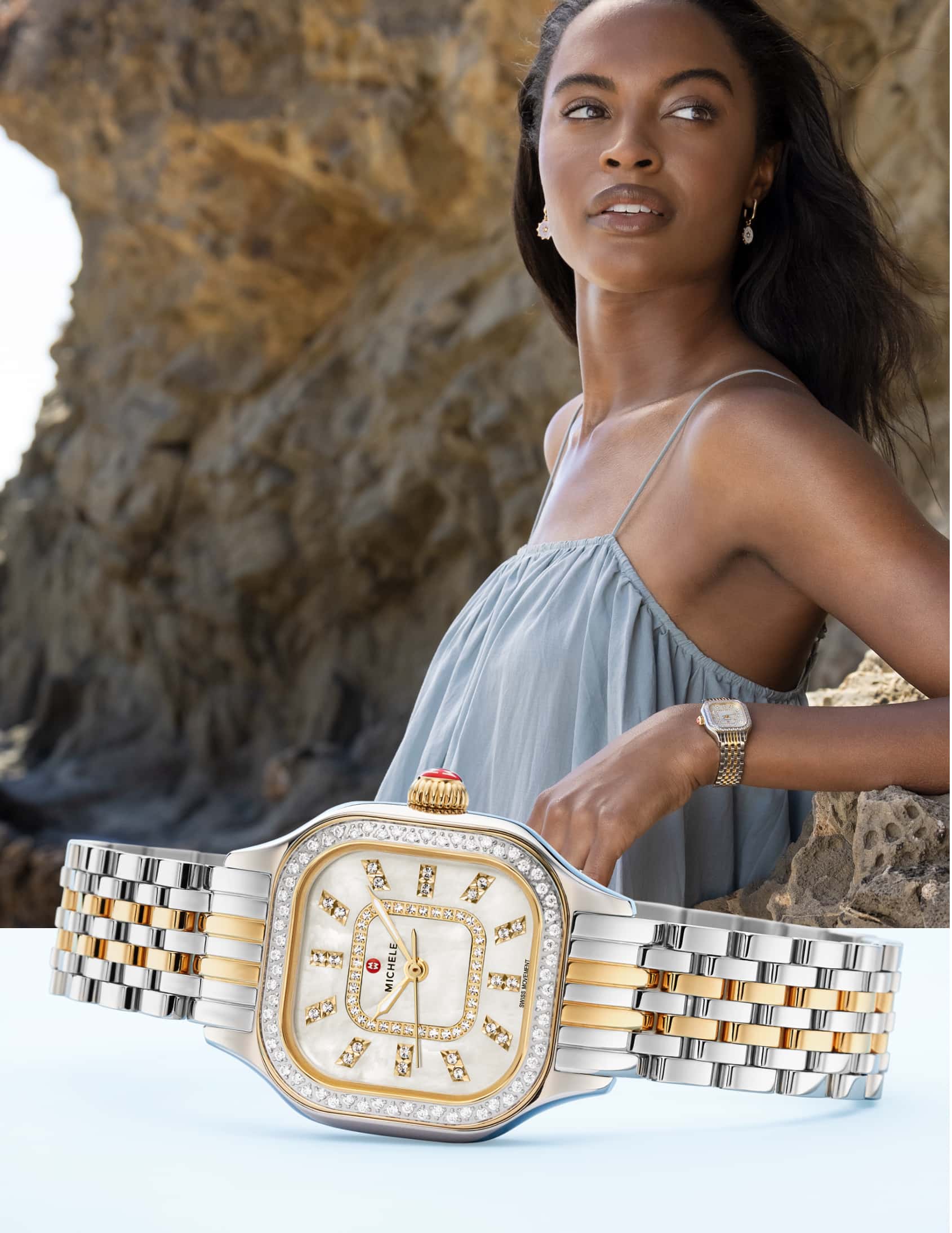 Stylish woman on beach wearing Meggie watch in stainless and 18K gold plating.