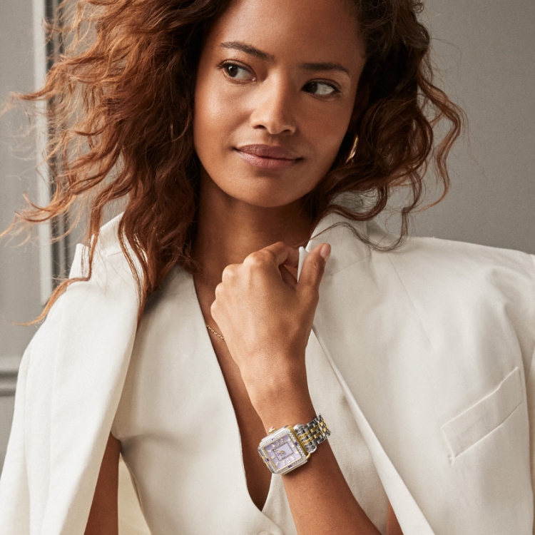 A woman wearing the Limited Edition Deco Charmante Amethyst