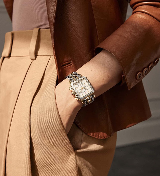 Woman wearing a Deco Collection watch.