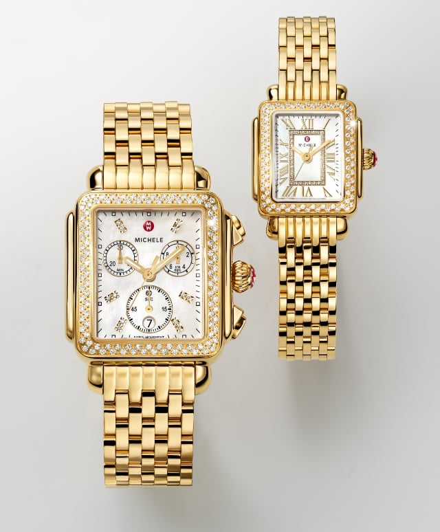 The Deco Diamond 18K Gold-plated watch shown next to the Deco Madison Mini Diamond 18K Gold-plated watch. Deco 33mm X 35mm case. Deco Madison Mini 23mm x 24mm case.