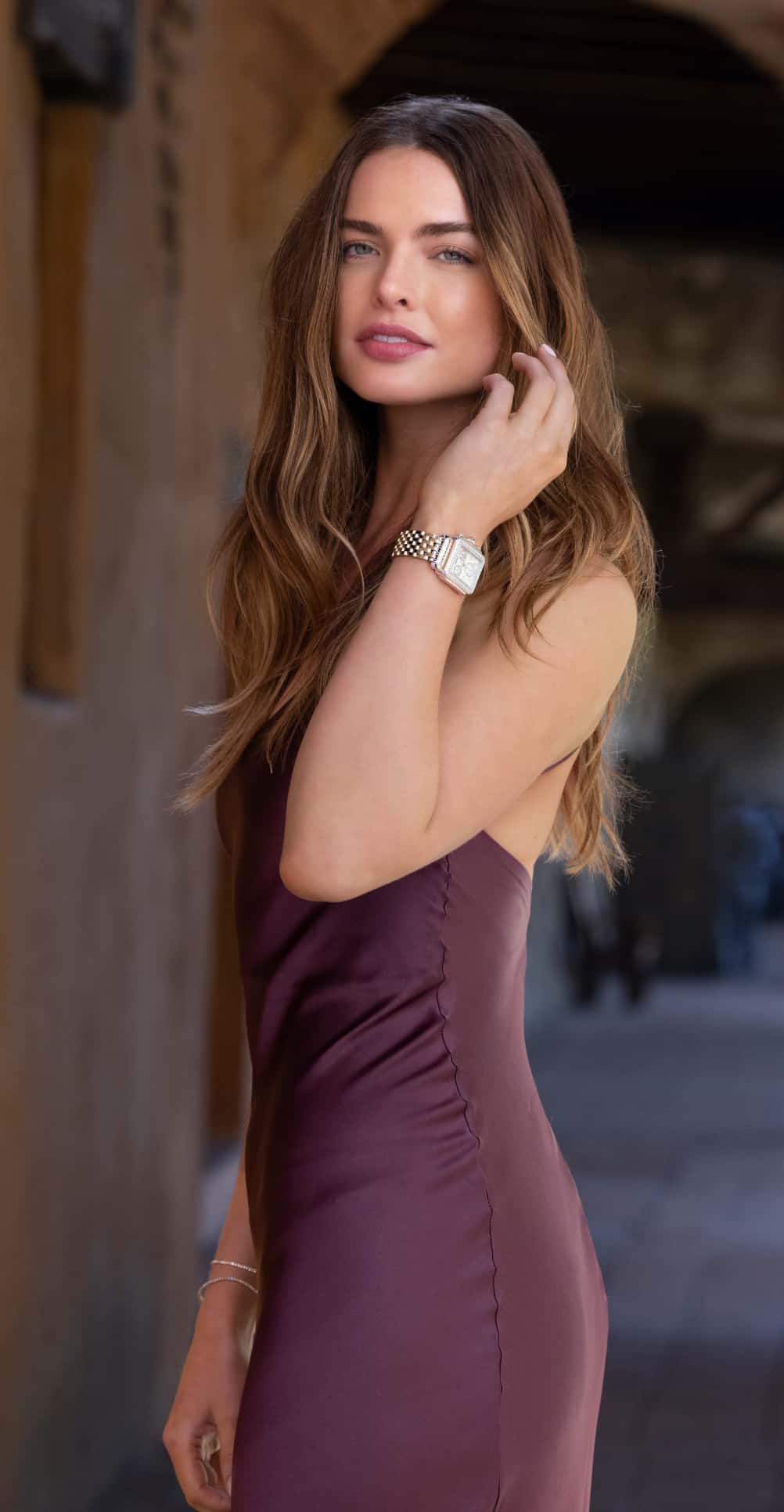 Fashionable woman wearing a Michele watch.