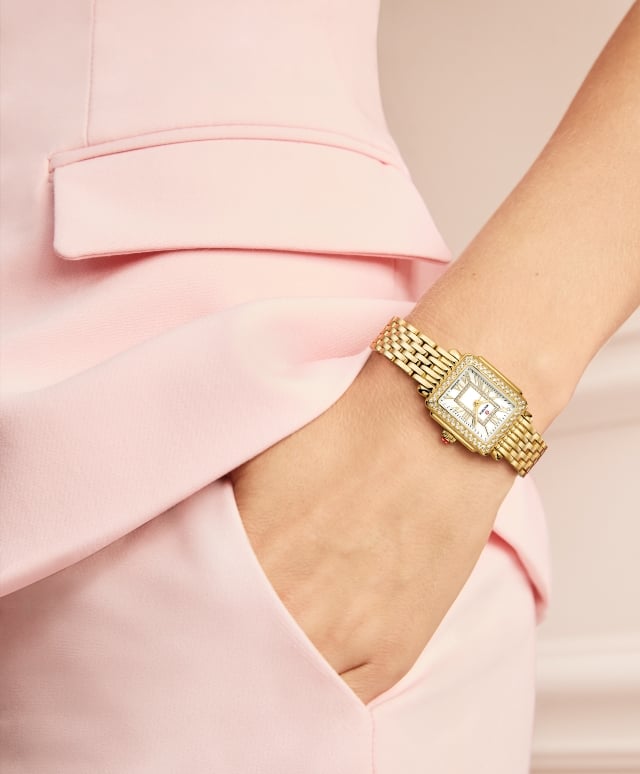 The Deco Madison Mini Diamond 18K Gold-plated watch shown on a wrist