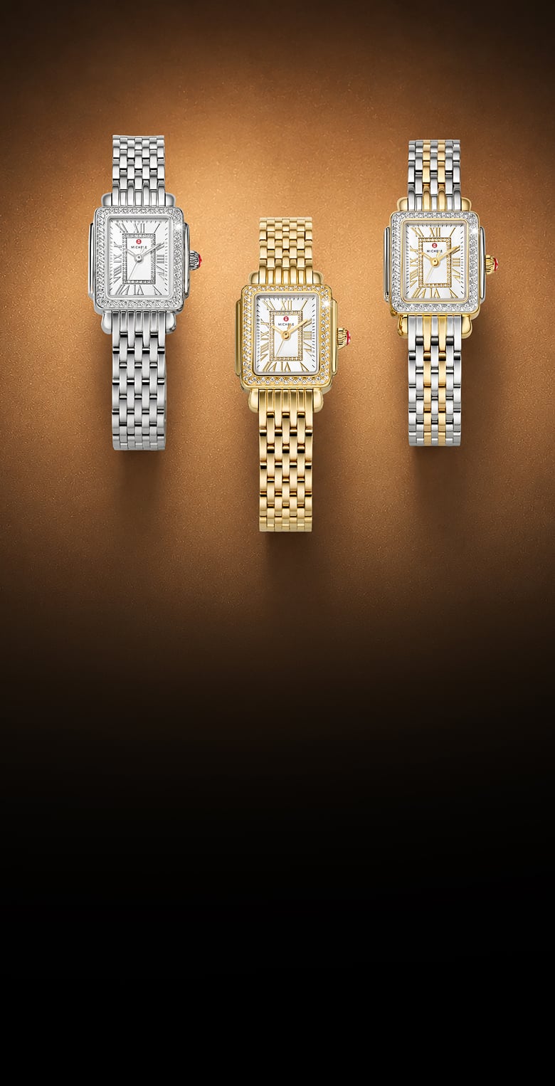 a close up shot of 3 deco madison minis in stainless, gold, and two tone