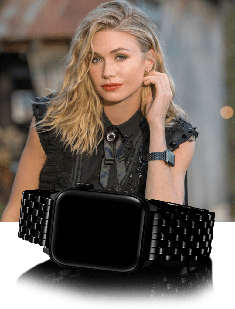 Stylish woman wearing black band for Apple Watch®