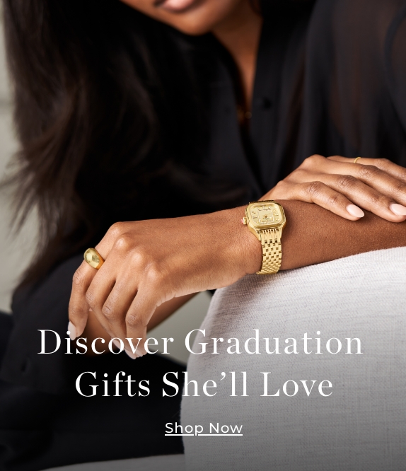 Discover Graduation Gifts She'll Love. A female model wearing the Meggie gold plated watch. 