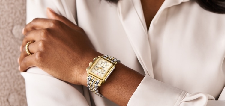 The Deco Diamond Two-tone 18K Gold-plated watch shown a wrist