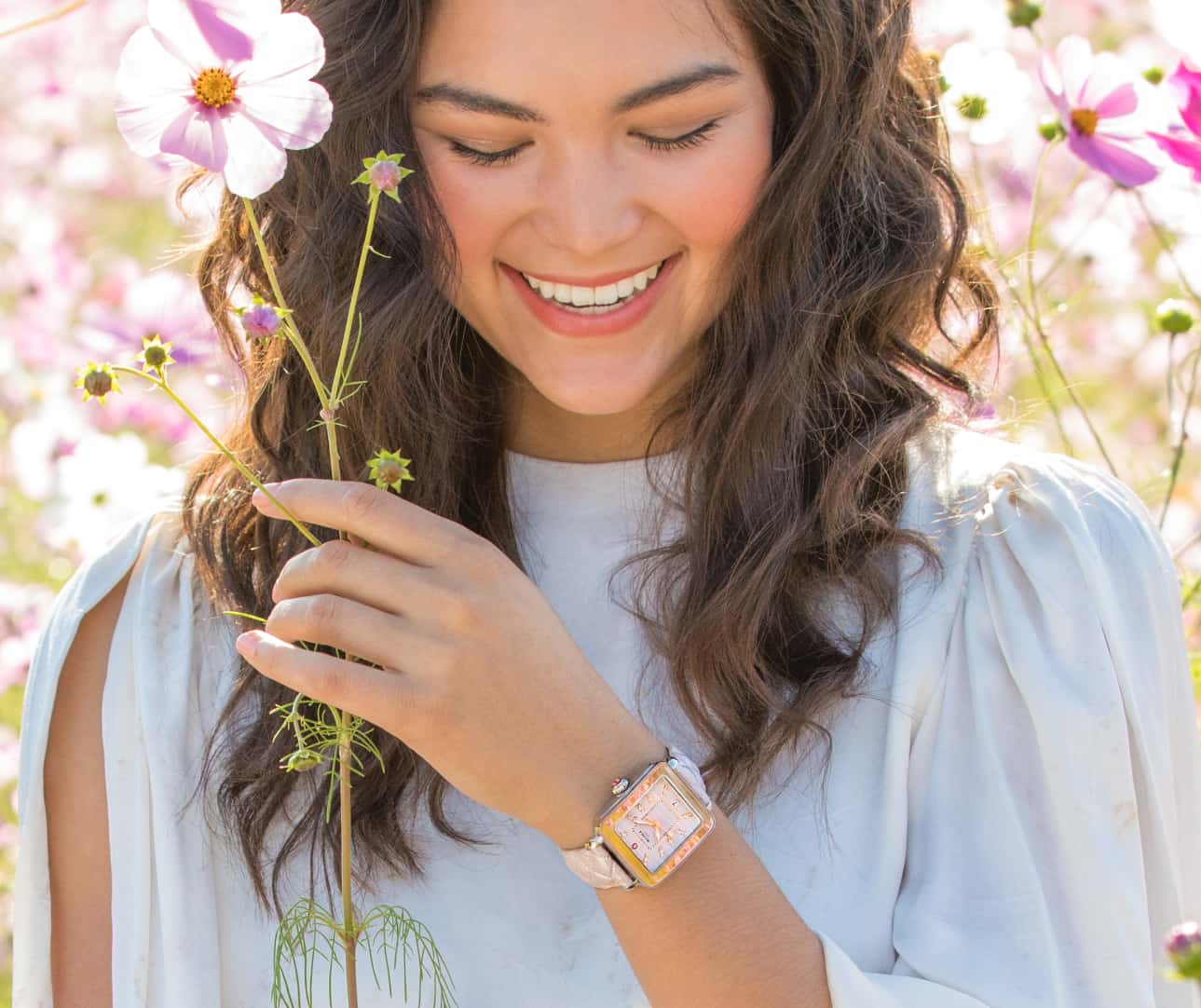 Youthful woman wearing Deco Sport watch with a sheen-finished quilted leather strap.