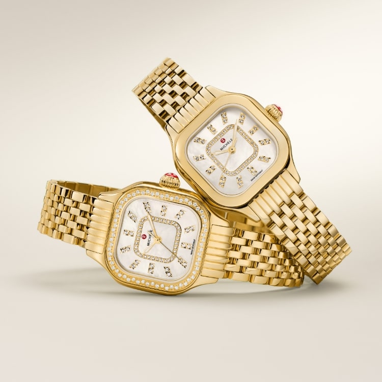 Four stacked Deco diamond watches