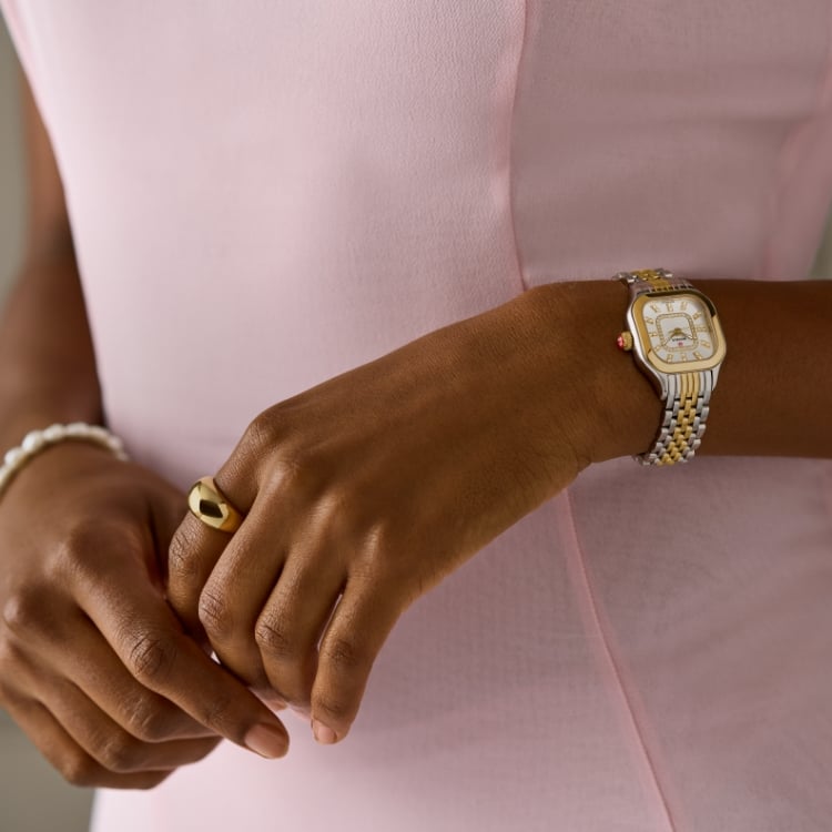 The Meggie Diamond Dial Two-tone 18K Gold-plated watch shown on a wrist