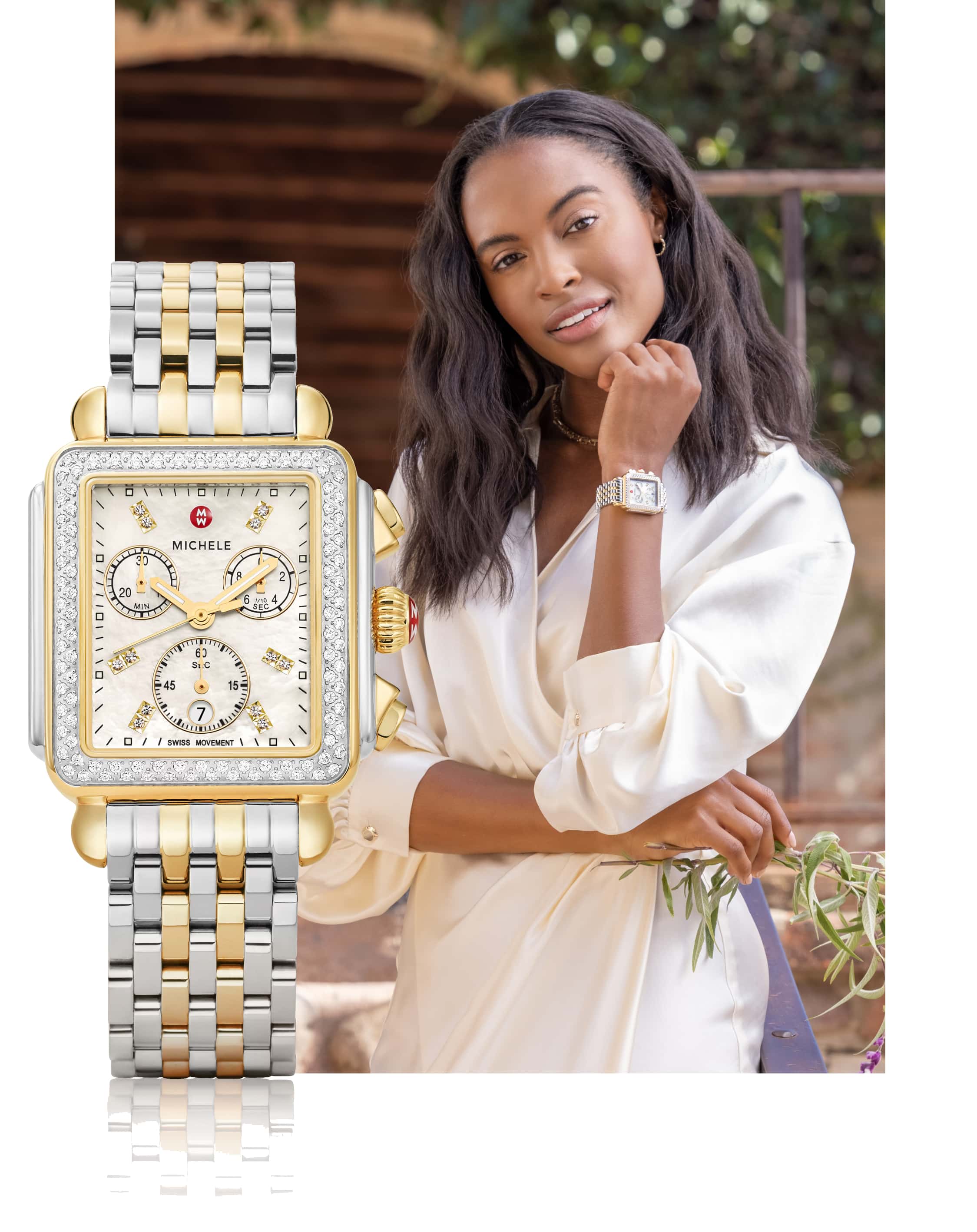 Stylish young woman wearing in a white dress wearing two-tone Deco Chronograph watch.