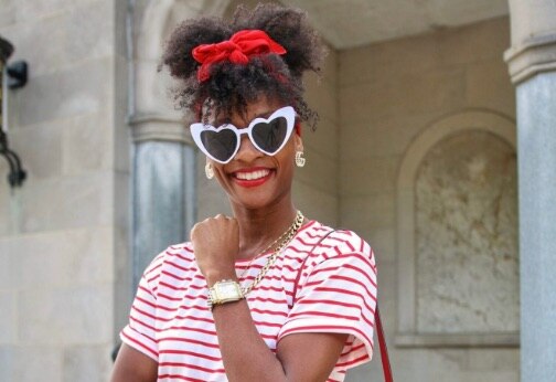 Style influencer Davida Janae wearing a cute and casual outfit with her two-tone Deco watch in stainless and 18k gold.