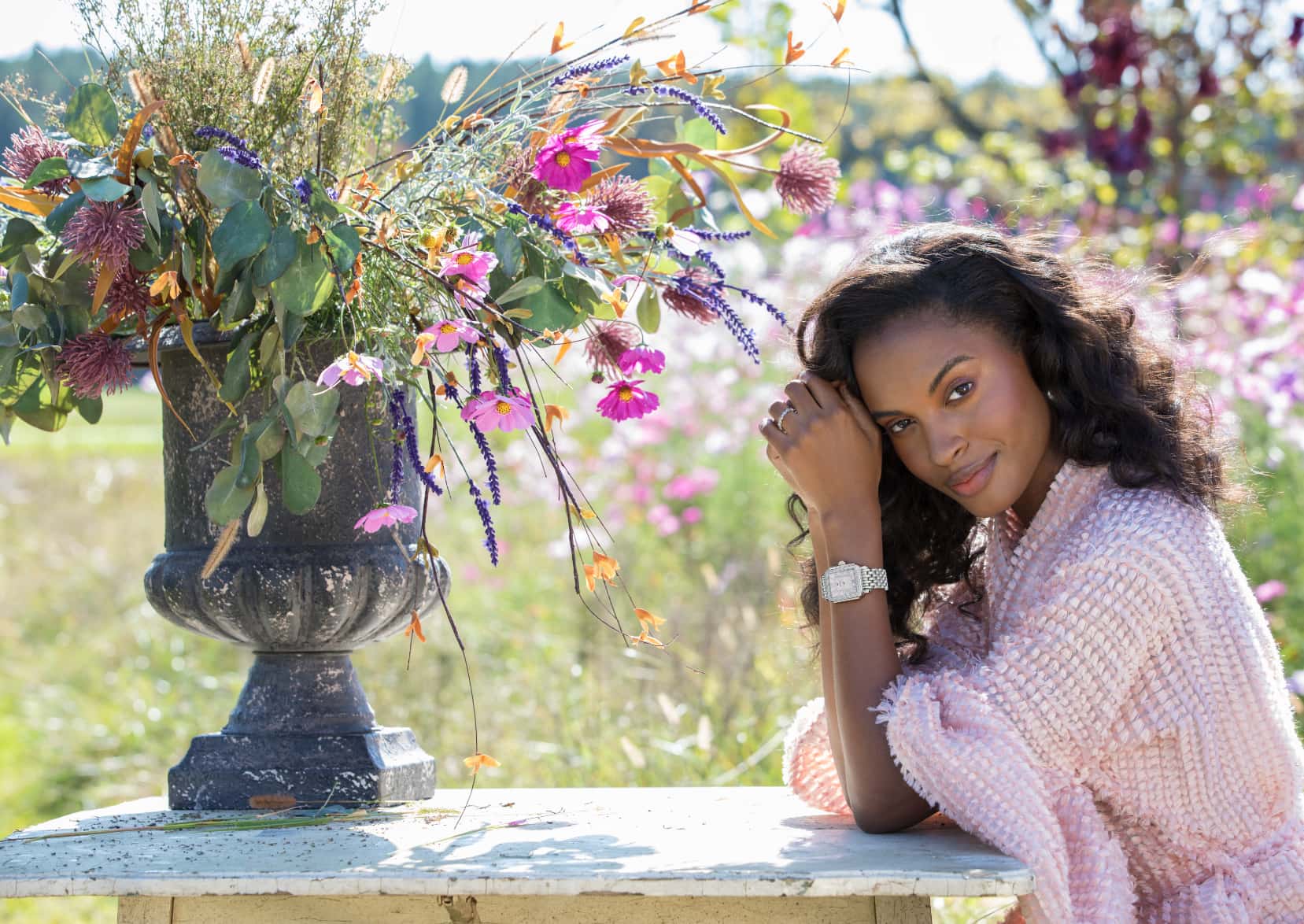 Two stylish women wearing Caber Isle watch in gold and Sporty Sport Sail watch in rose.