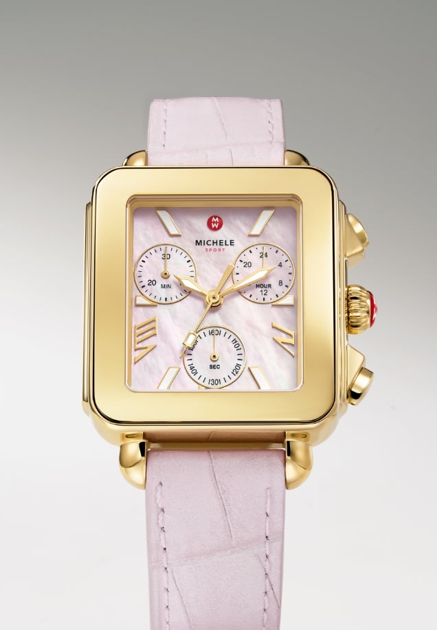 The Deco Sport Chrono watch in gold plating and a peony croco-embossed leather strap.