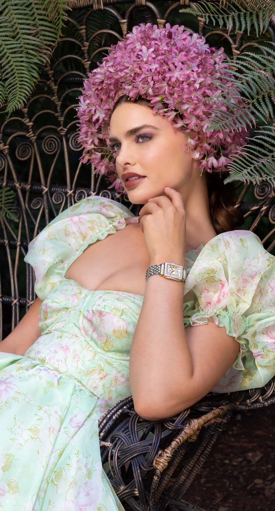 Woman in a floral crown wearing a Deco Madison Mid MICHELE watch.