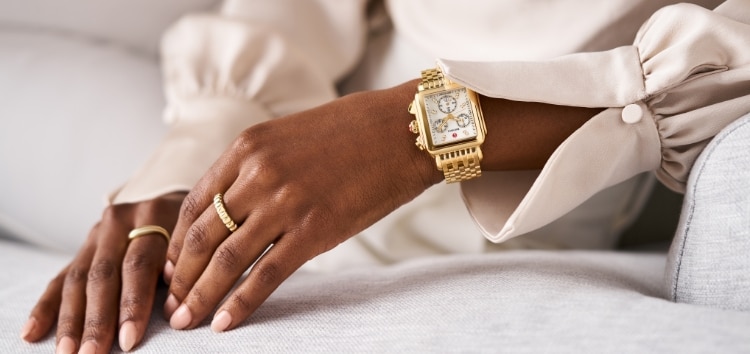 The Deco Diamond 18K Gold-plated watch shown a wrist