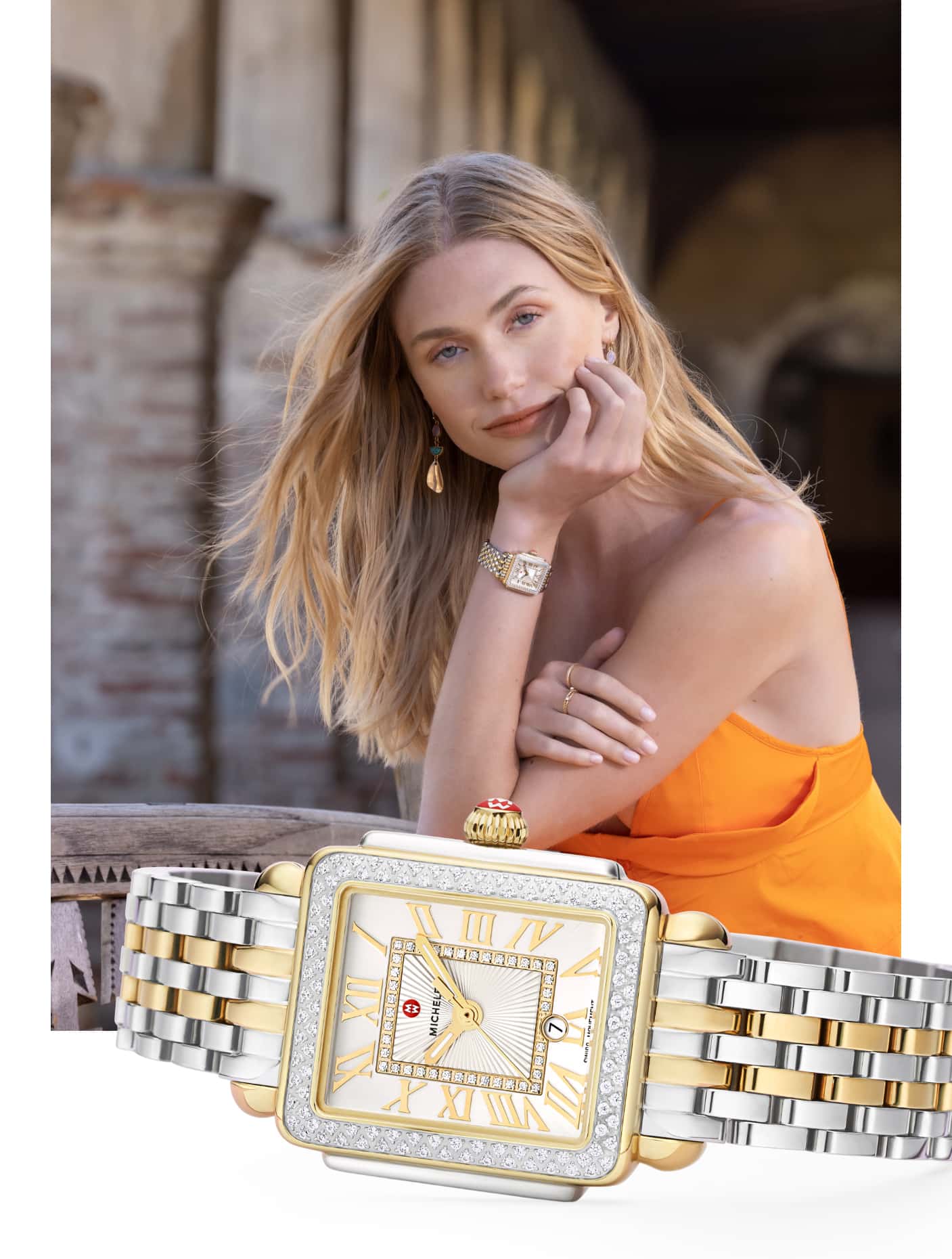 Stylish woman wearing Deco Madison mid watch in two-tone stainless with 18k gold plating.