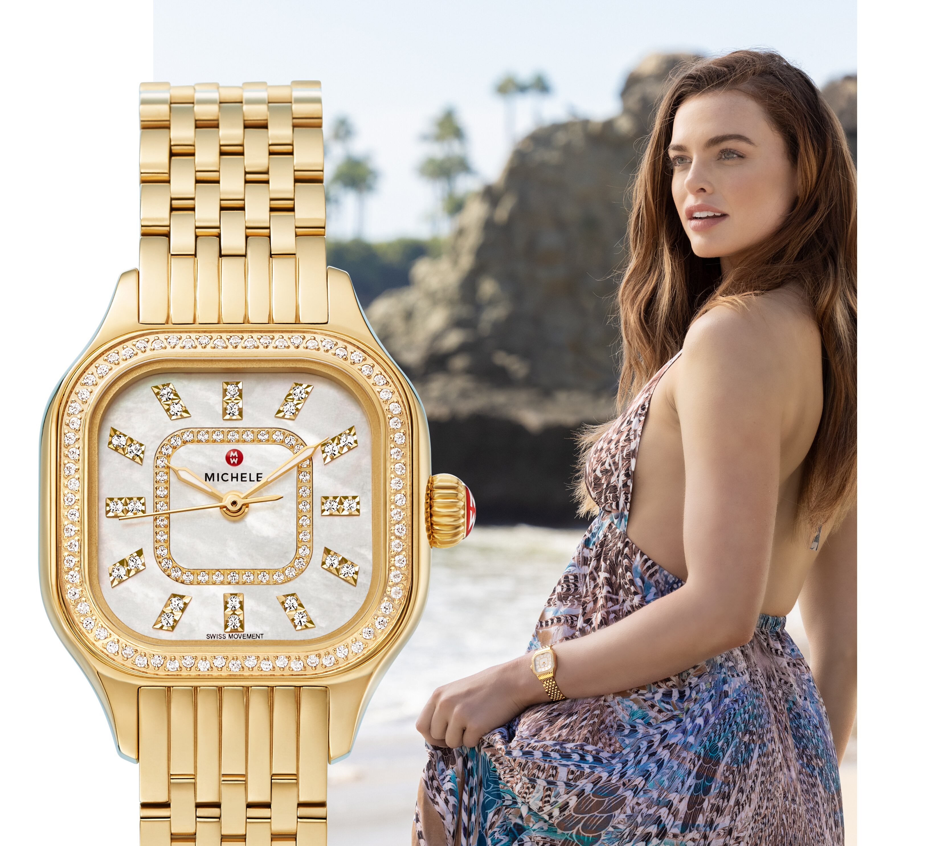 Stylish woman on beach wearing Meggie watch in 18k gold.