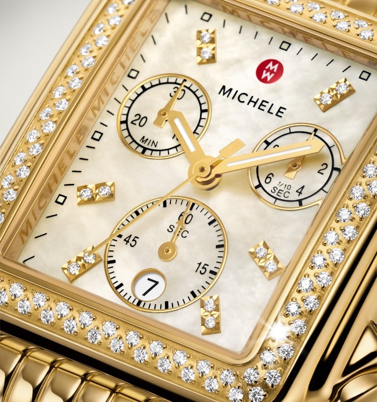A closeup of the Deco gold diamond watch