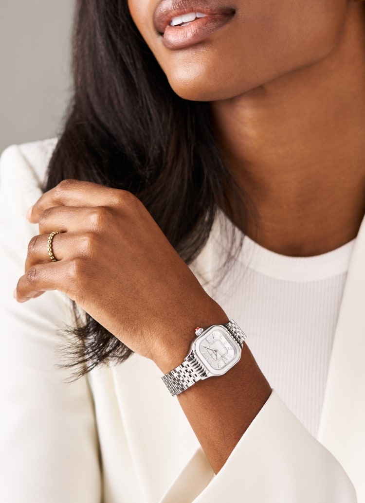 A woman wearing the Meggie Diamond Dial High Shine Stainless Steel watch