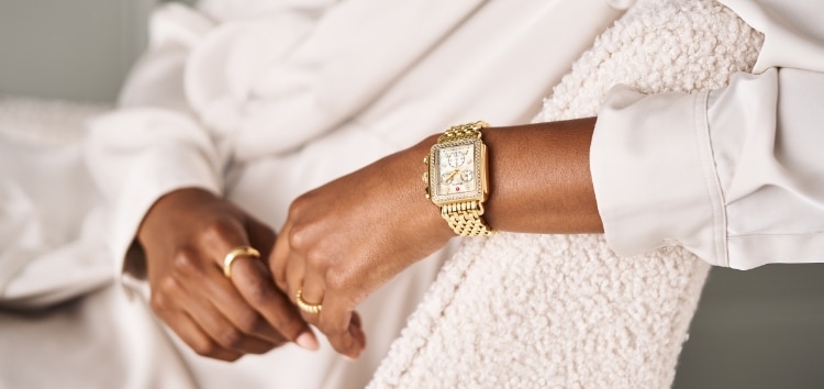 The Deco Diamond 18K Gold-plated watch shown a wrist
