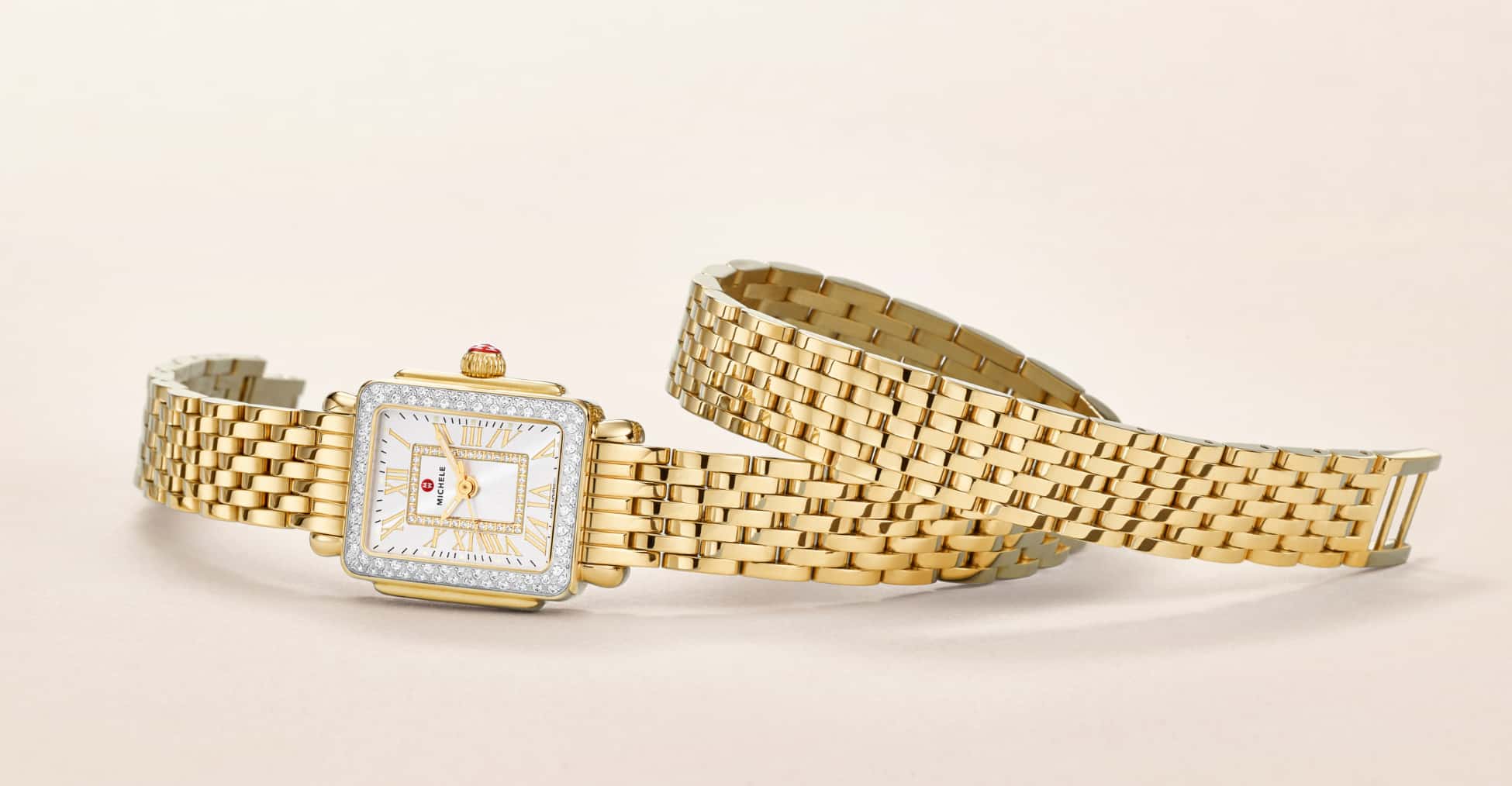 A double-wrap gold watch.
