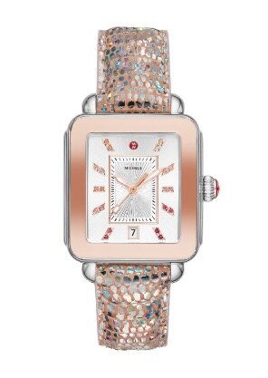 Deco Sport Watch featuring a pink gold IP-plated and stainless steel case, 22 hand-set Swarovski semi-precious topaz hour markers in pinks-to-reds on the silver sunray dial and an iridescent lizard strap.