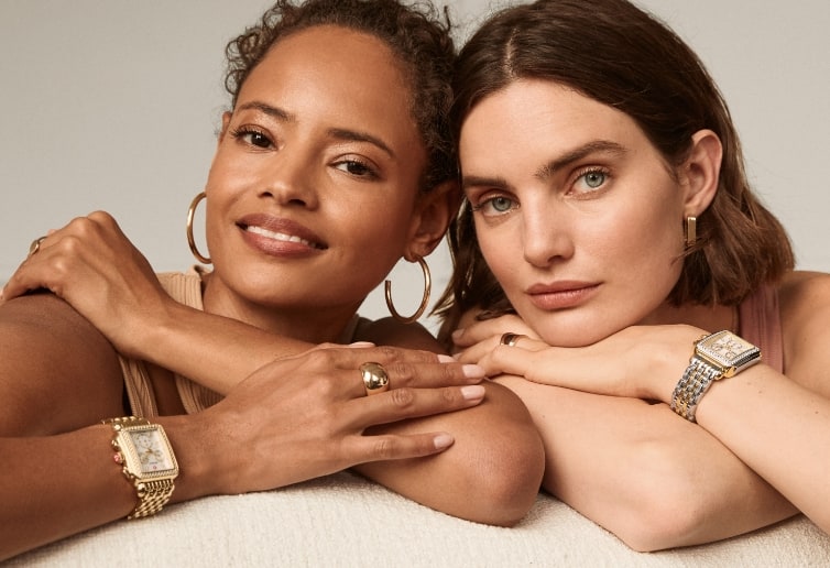 Two women wearing Deco Diamond watches in two-tone plating.