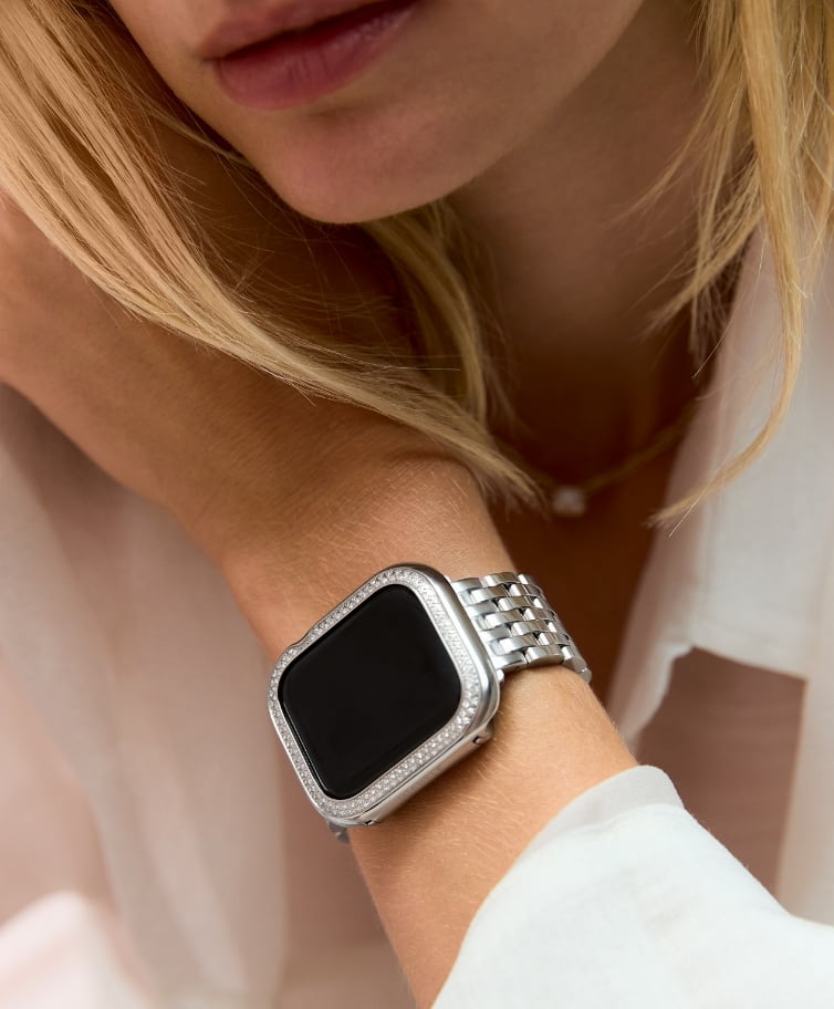 The stainless steel seven-link bracelet band and stainless steel diamond case for Apple Watch® shown on a wrist