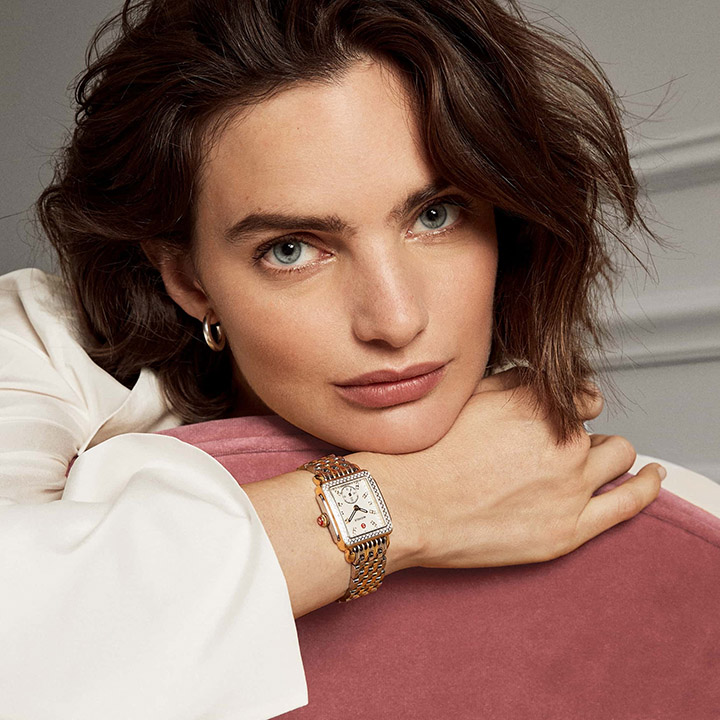 Woman wearing Deco Mid watch.