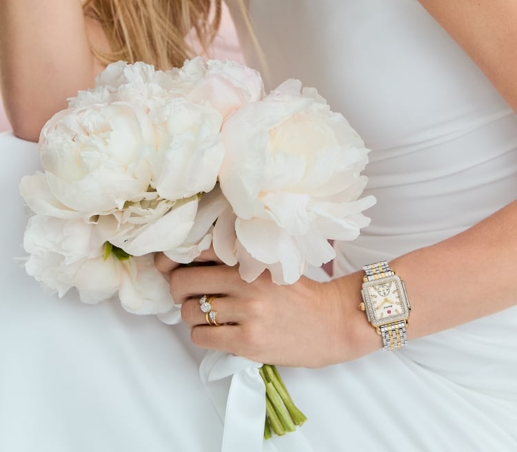 Video featuring women wearing various MICHELE watches