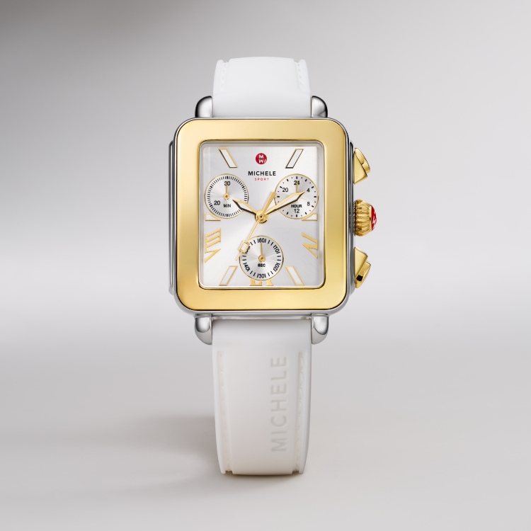 Detail shot of the Deco Sport Chrono watch in gold-tone plating with a white silicone strap.